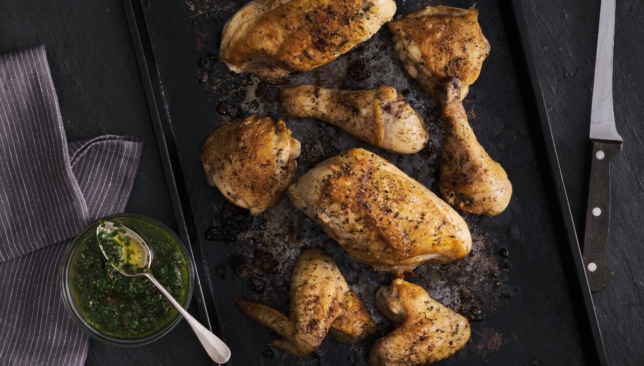 Full Service butcher shop with chicken and chimichurri sauce