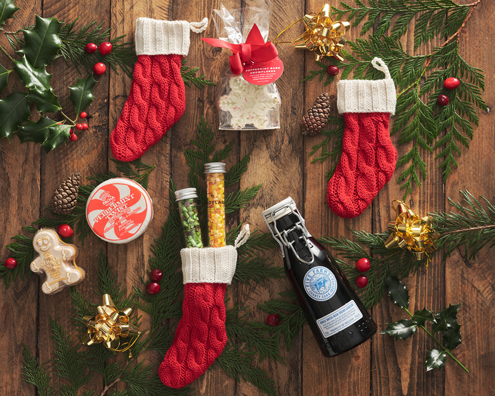 Stocking stuffers with candy and holiday gifts