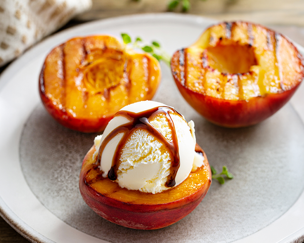 Grilled peach ice cream sundae