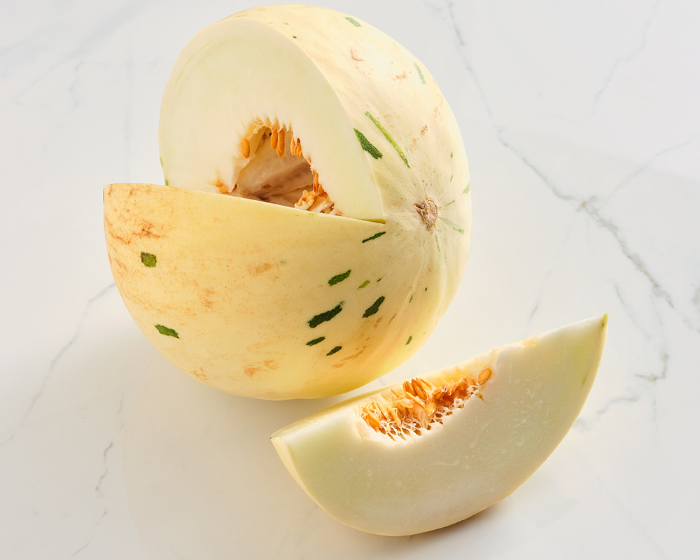Dino melon with cut wedge