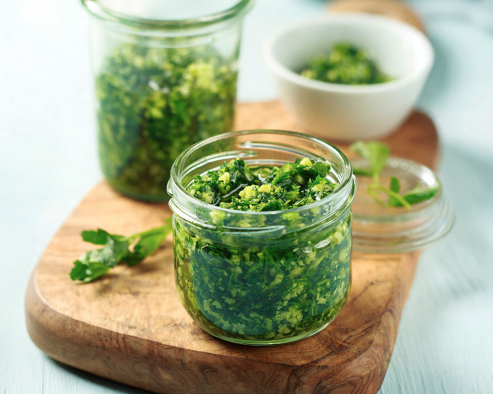 Carrot top pesto in small mason jar
