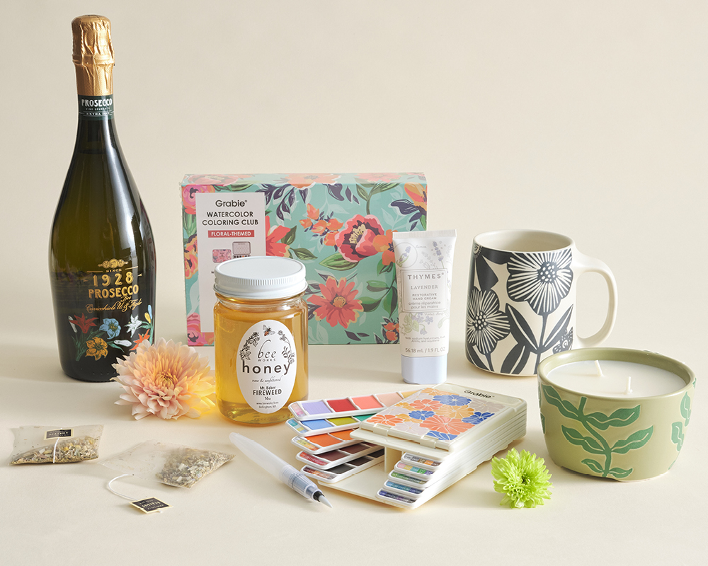 An assortment of gifts on a cream background